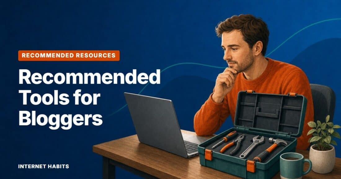 A man works at his laptop beside a large open toolbox, with the words 'Recommended Tools for Bloggers'.